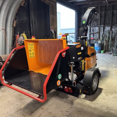Large tow-behind wood chipper for commercial tree work